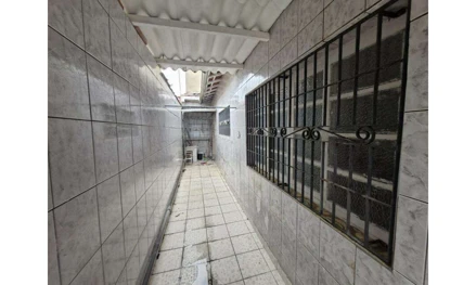 Casa em Praia Grande, Real, Rua Malmequer, 249 - Real, SP. Área: 102.57m2