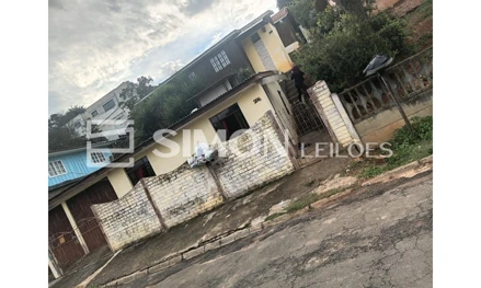 Terreno urbano com casa de madeira em Piraí do Sul, Jardim Favoreto, Rua Humberto Favoretto, 296, PR. Área: 312m2